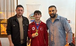 KAS-DER yönetimi Dünya Şampiyonu Göksu'yu ağırladı